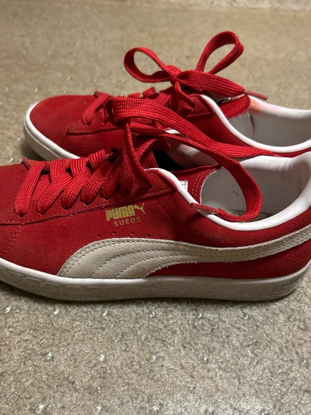 Puma Red and White Low-Top Sneakers with Gold Logo Accent